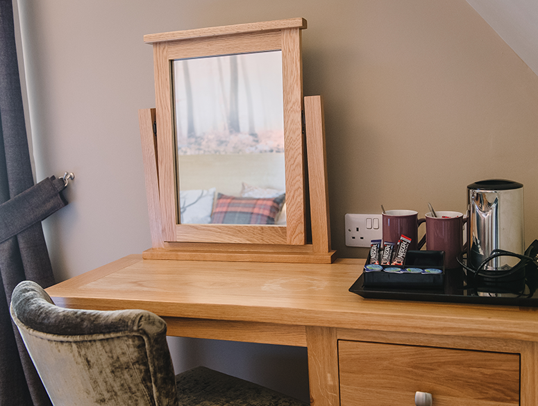 Desk and mirror in a delux family room