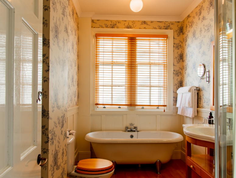 Roll top bath in a classic double room at the Boat